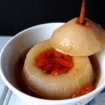 steamed whole pear with rock sugar and goji berries