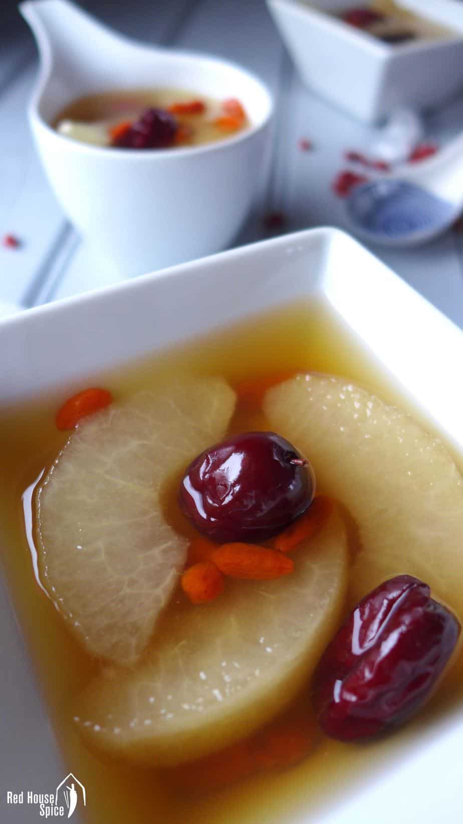 Boiled pear slices in a sugary syrup.