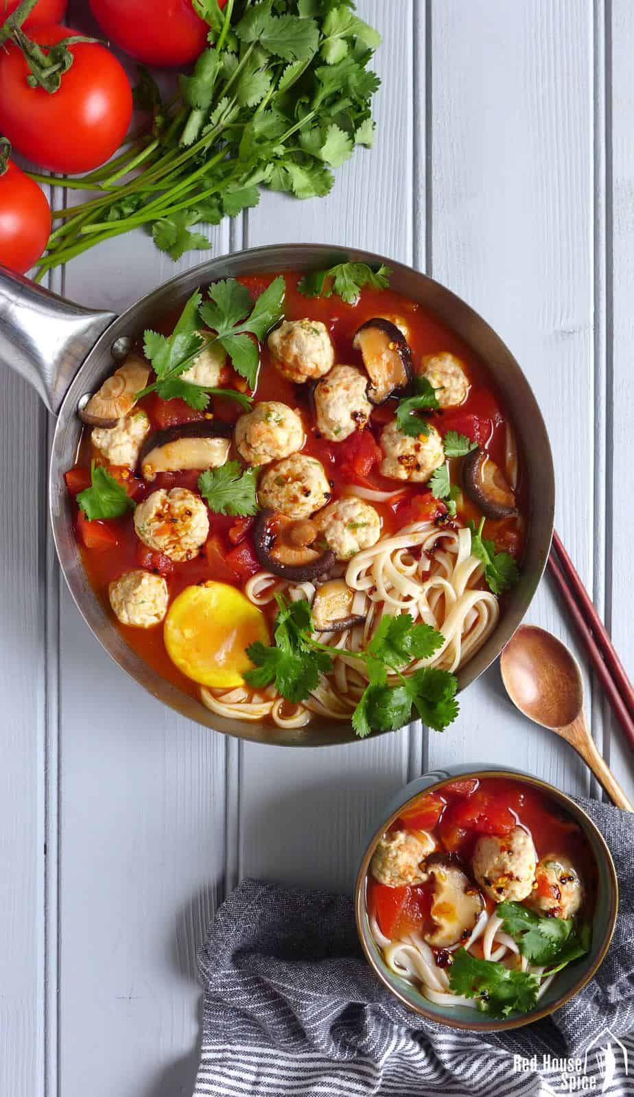 Tender and springy meatballs cooked in tomato and shiitake soup. This chicken meatball noodle soup is super tasty, filling and healthy.