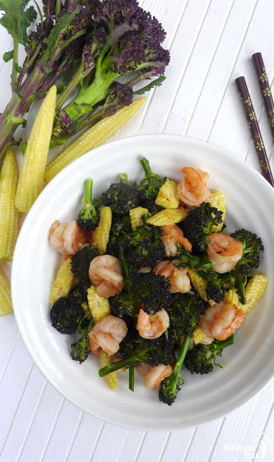 Fresh, crunchy, healthy and very easy to cook, purple sprouting broccoli and prawn stir-fry is a great seasonal dish to try.