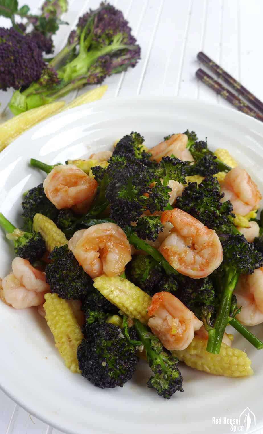 Fresh, crunchy, healthy and very easy to cook, purple sprouting broccoli and prawn stir-fry is a great seasonal dish to try.