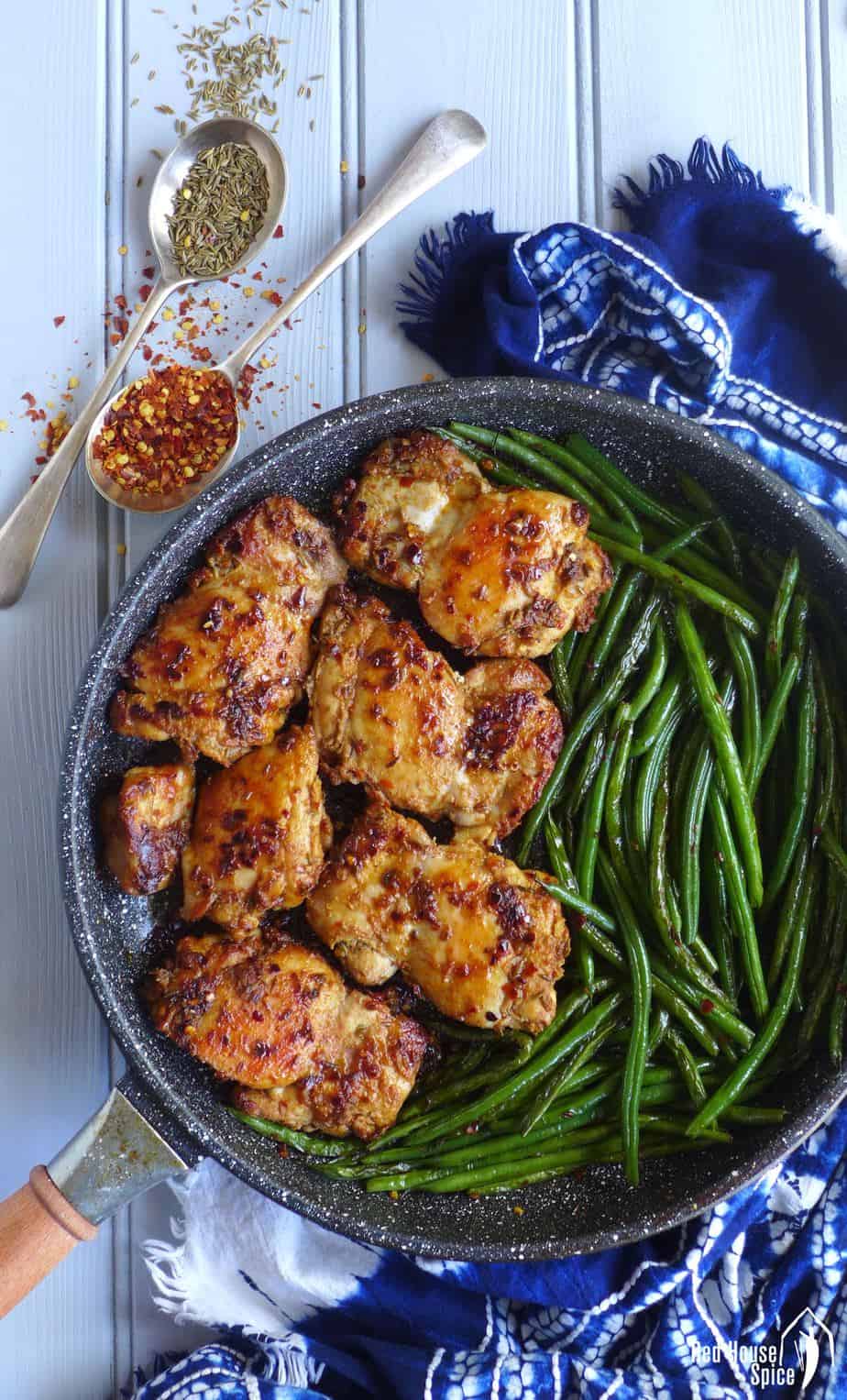 Quick to cook and difficult to fail, spicy cumin chicken thighs with green beans is inspired by a popular Chinese street food. An easy pan-fried dish full of flavour. 
