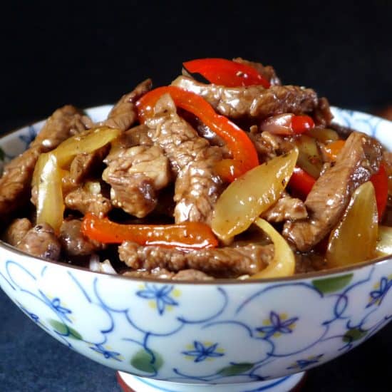 A bowl of black pepper beef stir-fry
