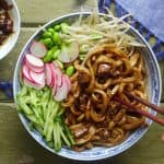 Beijing Zha Jiang noodles with pork, cucumber and bean sprout toppings