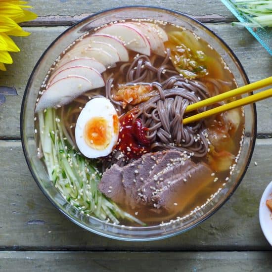 Slippery noodles in ice cold soup, served with various healthy toppings, cold soba noodles in beef broth is a perfect dish to cool you down in hot weather.