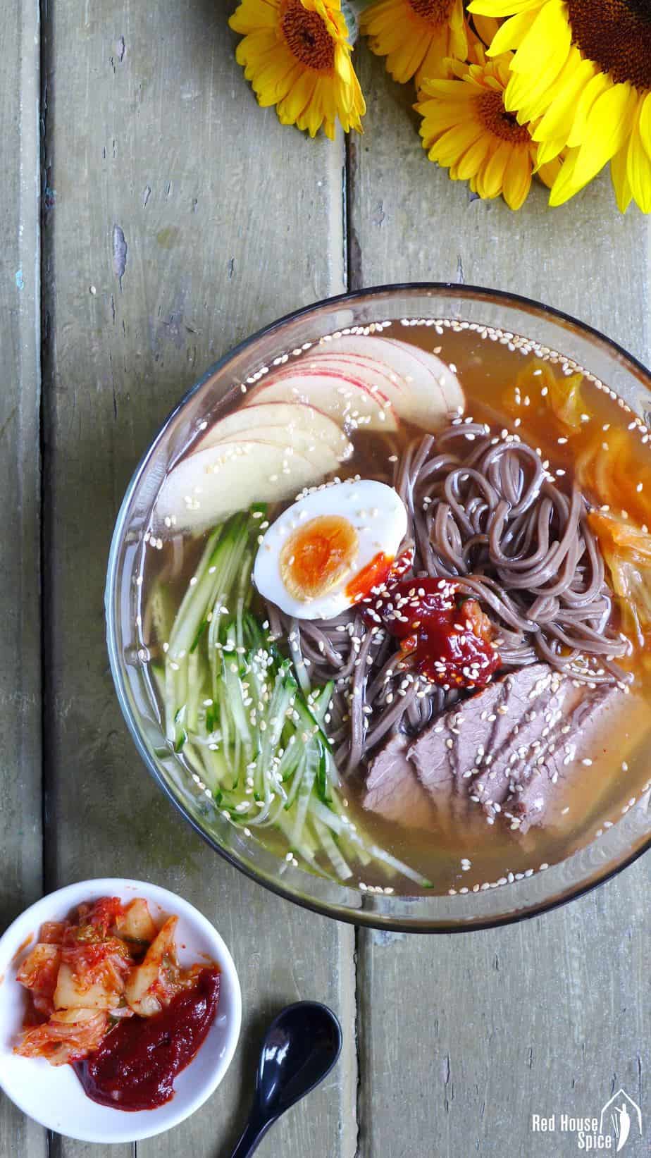 Slippery noodles in ice cold soup, served with various healthy toppings, cold soba noodles in beef broth is a perfect dish to cool you down in hot weather.