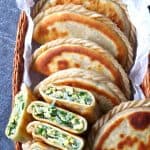 Pan fried flat dumplings filled with fragrant Chinese chive, soft scrambled eggs and springy vermicelli noodles, Chinese chive pockets are simply irresistible.