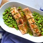 A healthy, tasty dish ready in 10 minutes. Steamed salmon fillets with homemade spring onion oil is aromatic, moist and tender.