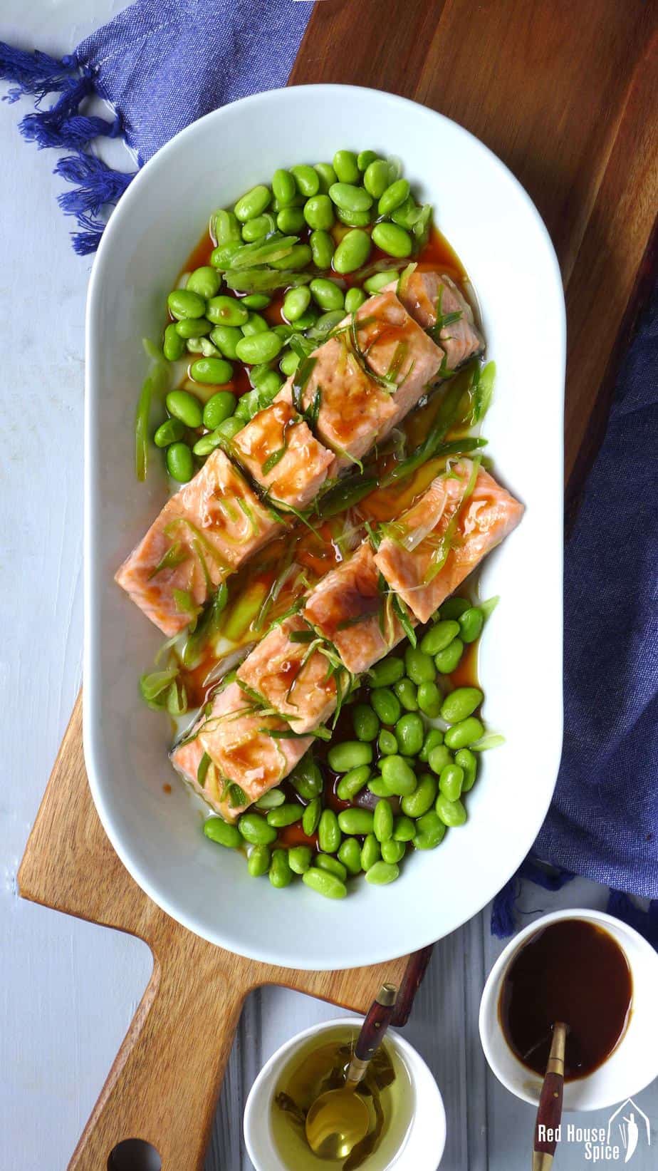 A healthy, tasty dish ready in 10 minutes. Steamed salmon fillets with homemade spring onion oil is aromatic, moist and tender.