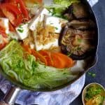 A bowl of tofu soup with various vegetables can be very refreshing and soothing, and the addition of papery dried shrimp makes it even more appealing.