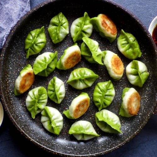Pan-fried vegetarian dumplings resemble Pak Choi and have a crispy base.