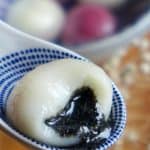 A Tang Yuan, Chinese glutinous rice balls (汤圆), with black sesame seeds.