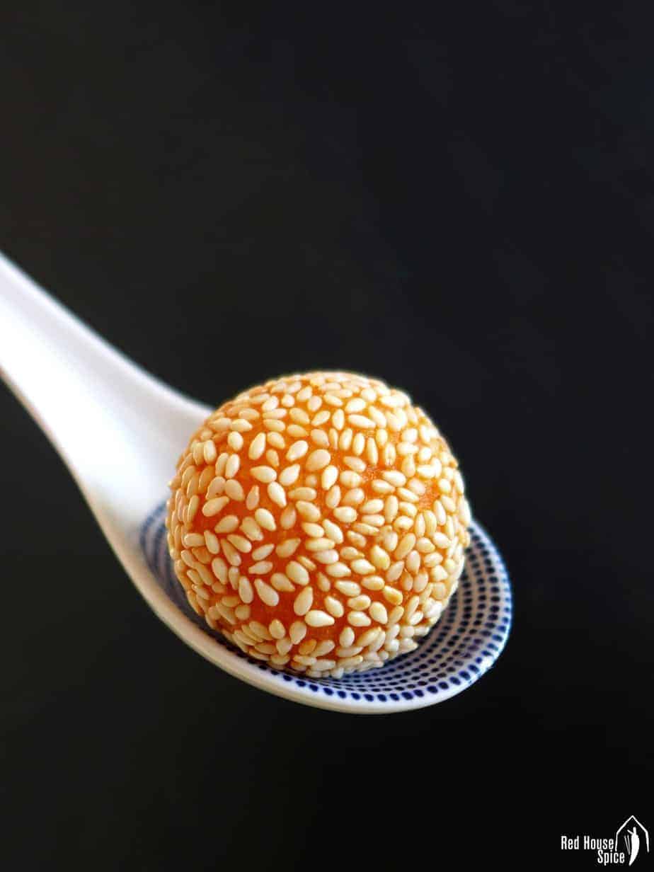 One sesame ball in a spoon