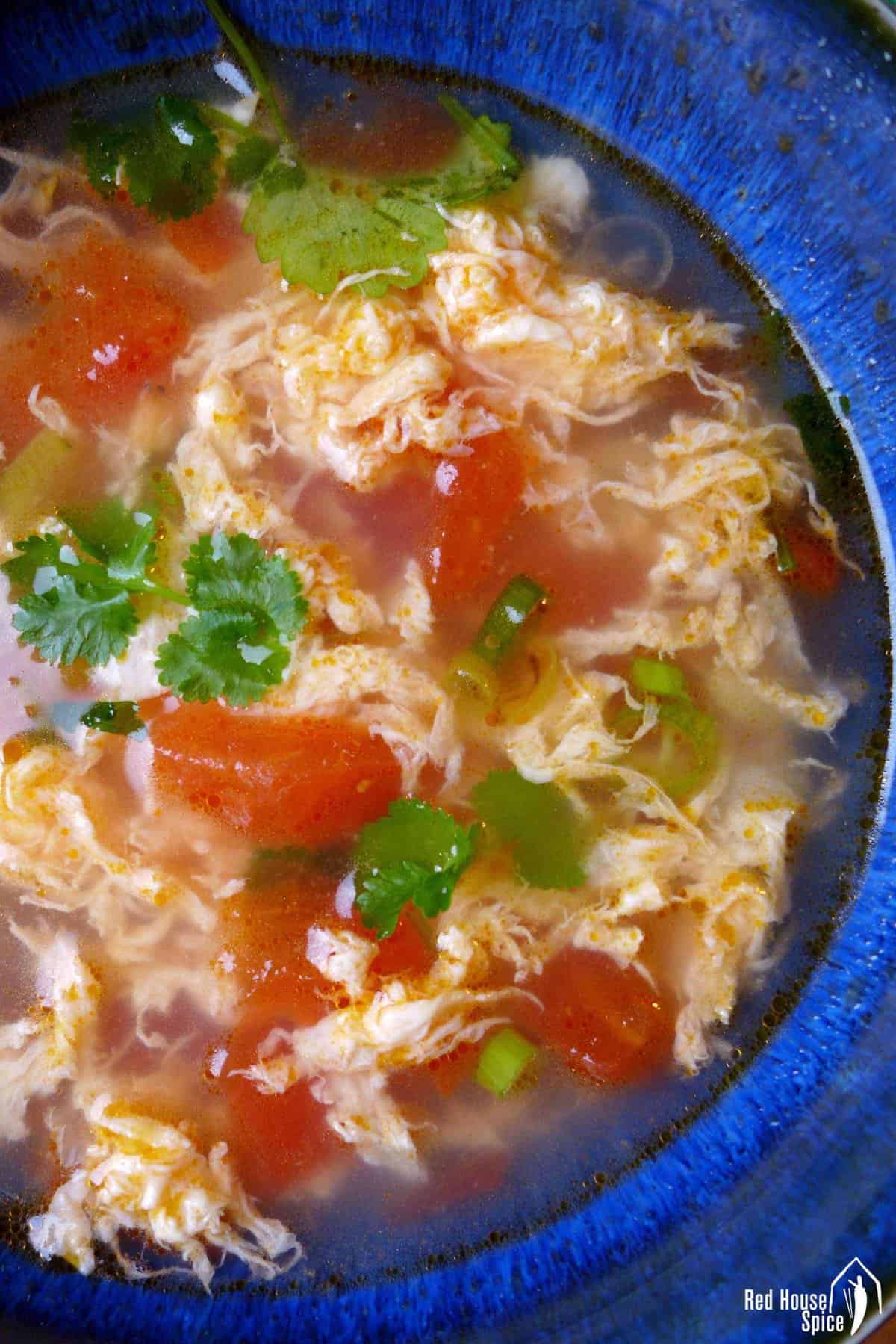 soup with tomato and egg.