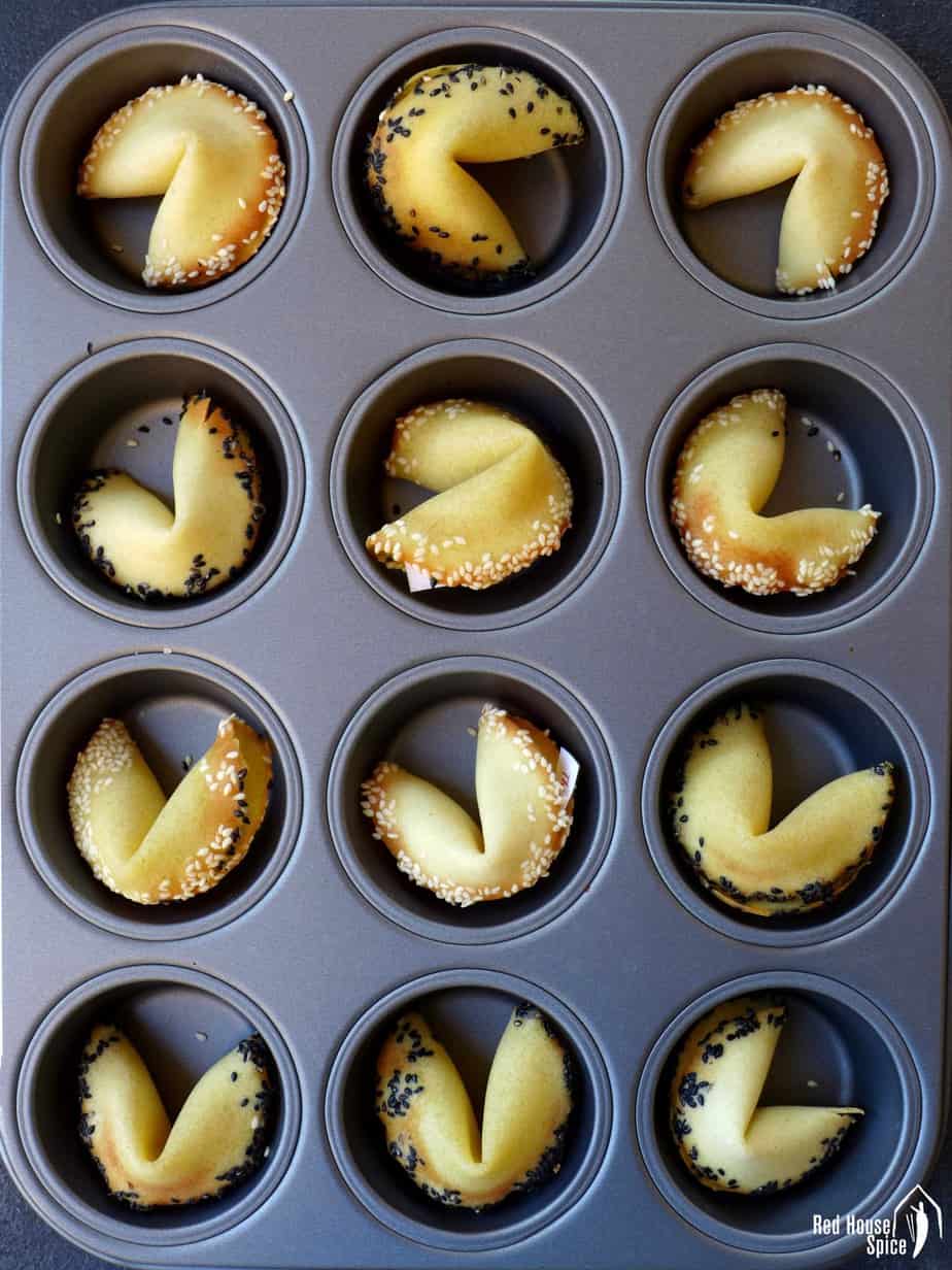 Fortune cookies in a muffin tray