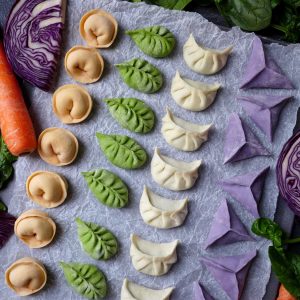 Chinese dumplings made in four colours and shapes