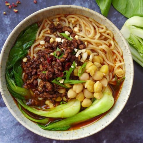 A bowl of Chongqing noodles with minced meat and Bok Choy