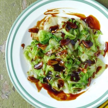 A plate of iceberg lettuce with oyster sauce