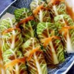 Steamed cabbage rolls with sauce