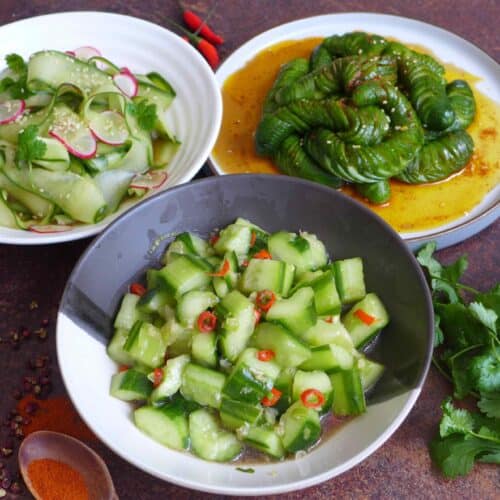 Three plates of Chinese cucumber salad