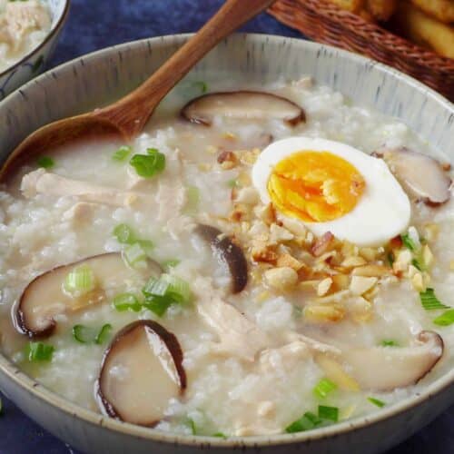 Chinese congee with chicken, egg and mushroom