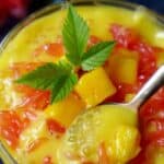 Mango sago dessert with a spoon in the serving bowl