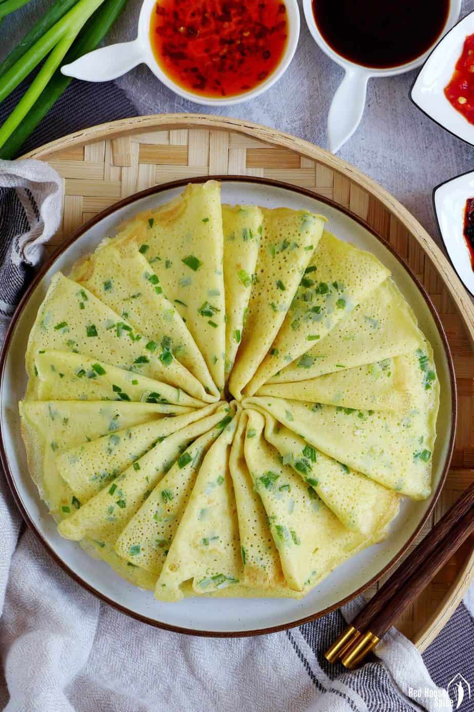 A plate of Chinese egg & scallion crepes