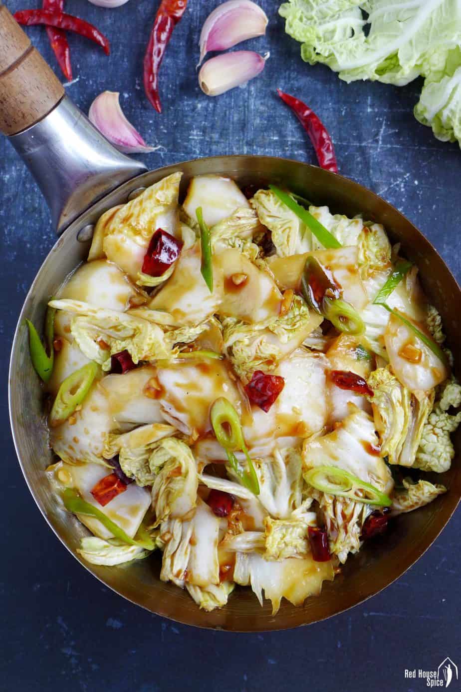 Hot & sour napa cabbage stir-fry in a wok