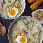 two bowls of chinese chicken congee with mushroom