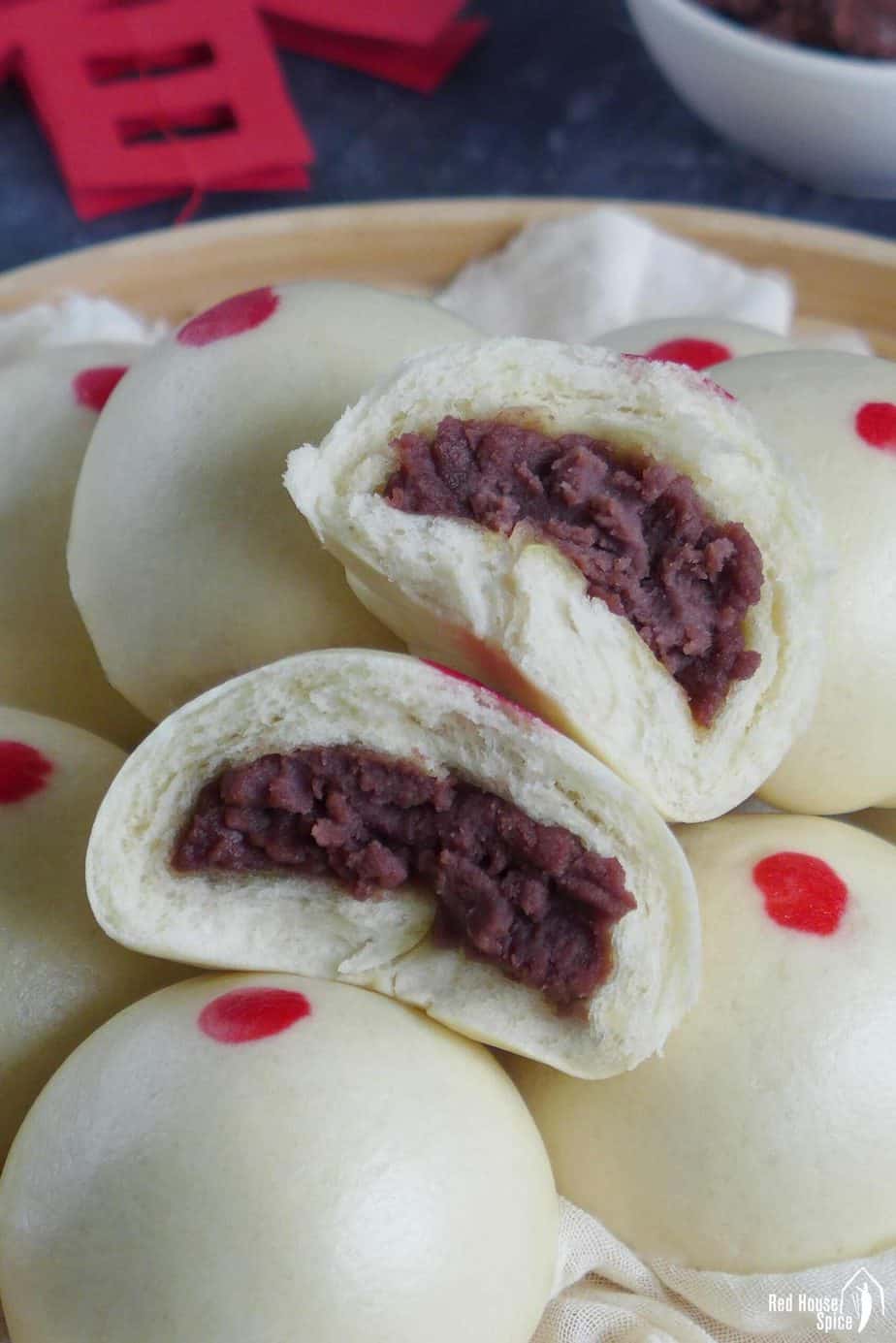 Steamed buns filled with red bean paste.