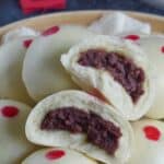 Steamed buns filled with red bean paste.