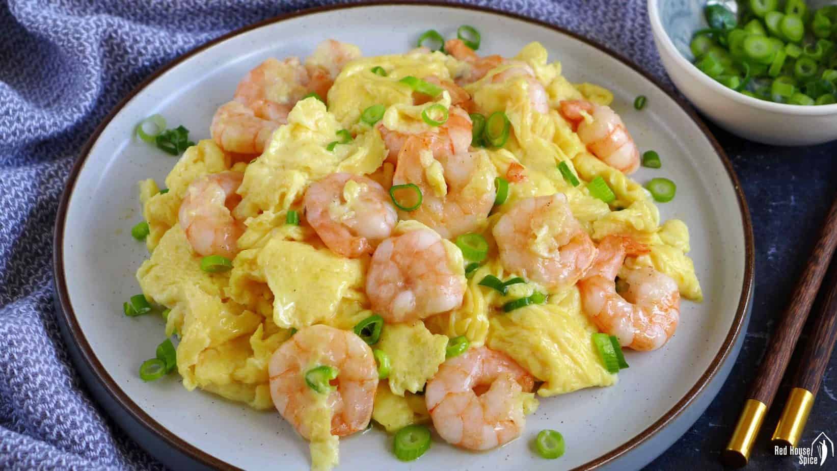 A plate of Chinese shrimp and egg stir-fry