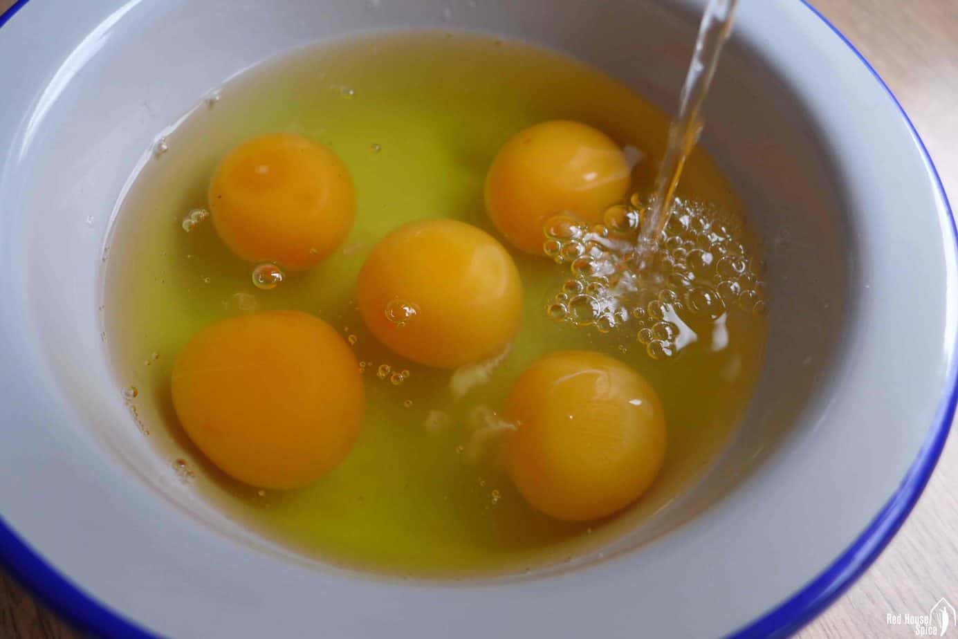 adding water to eggs