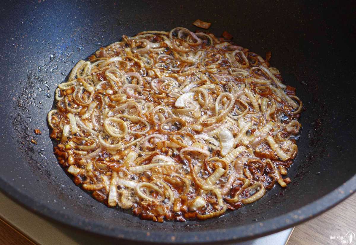 frying sliced shallots in oil
