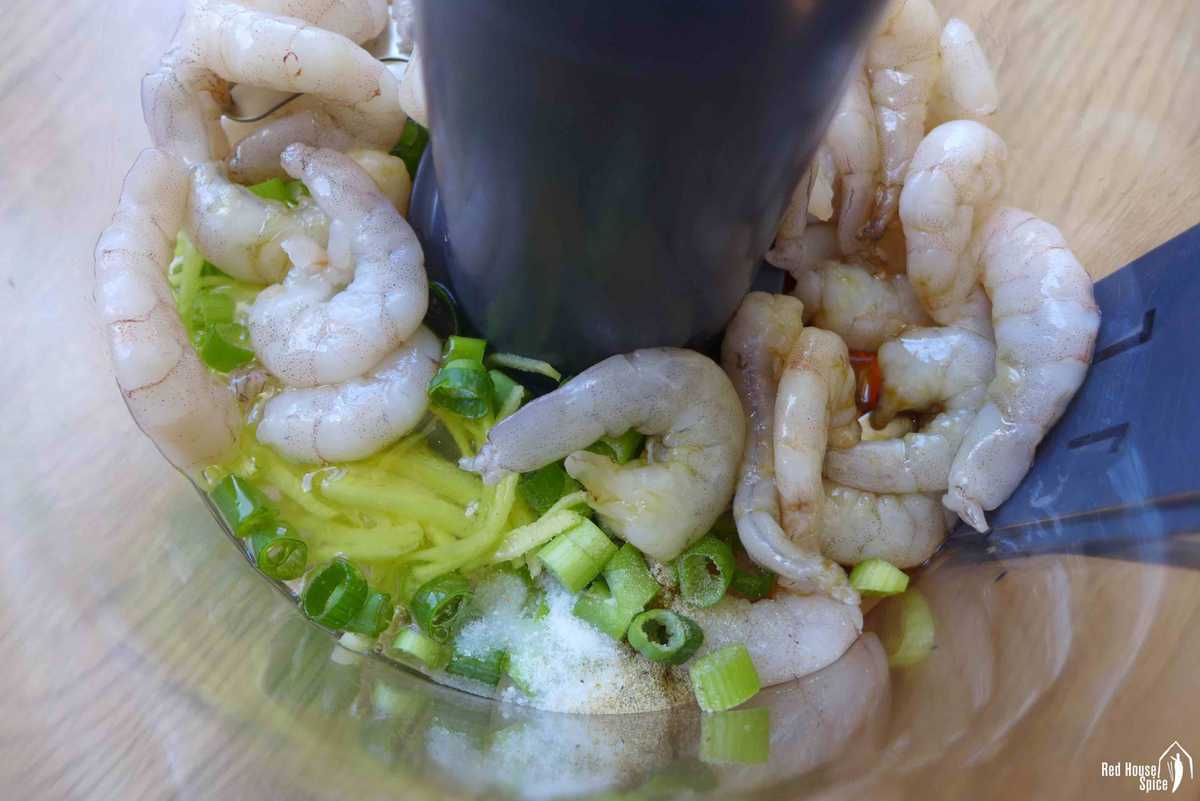 shrimp, egg white, scallions and ginger in a food processor.