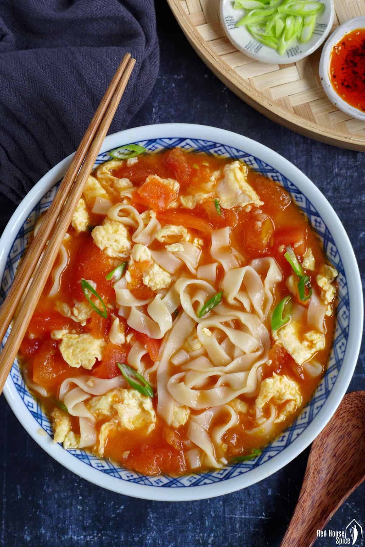 A bowl of Chinese tomato and egg noodle soup