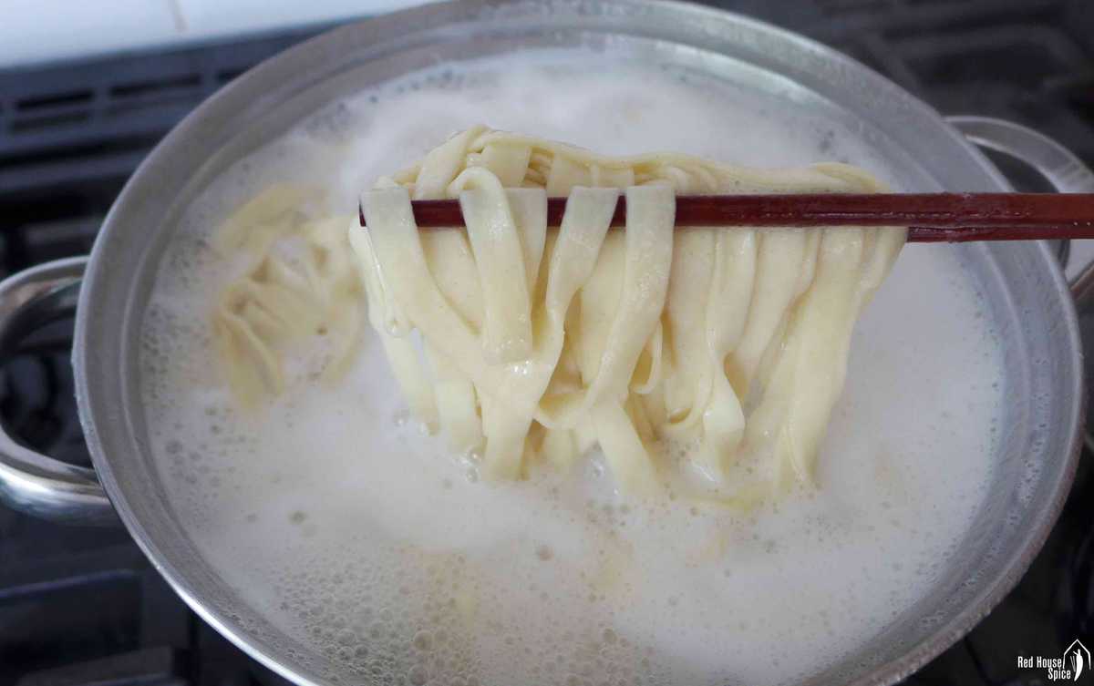 Boil noodles in water