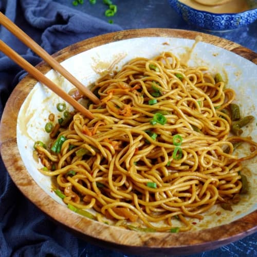 Hot dry noodles with sesame paste dressing and scallions