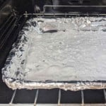 baking soda on a tray inside an oven