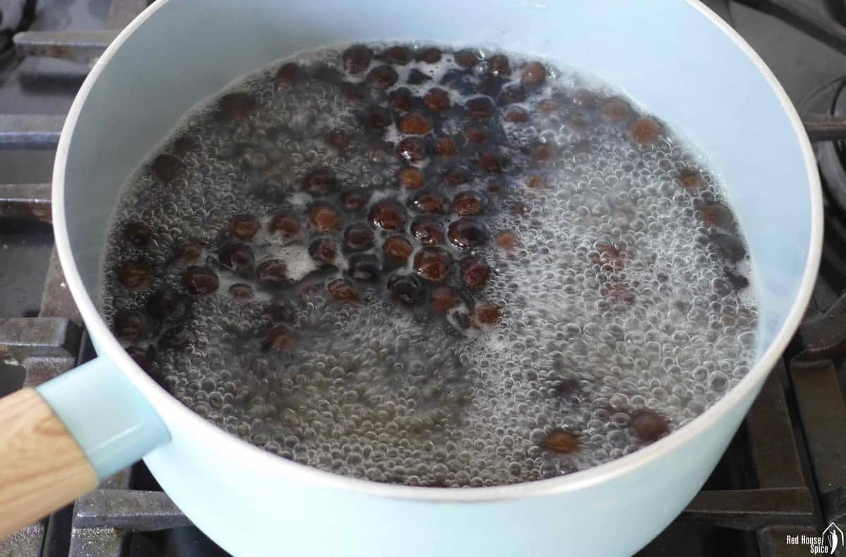 boiling tapioca pearls in a pot