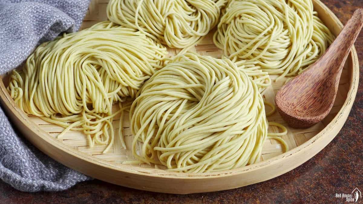 fresh homemade alkaline noodles on a tray
