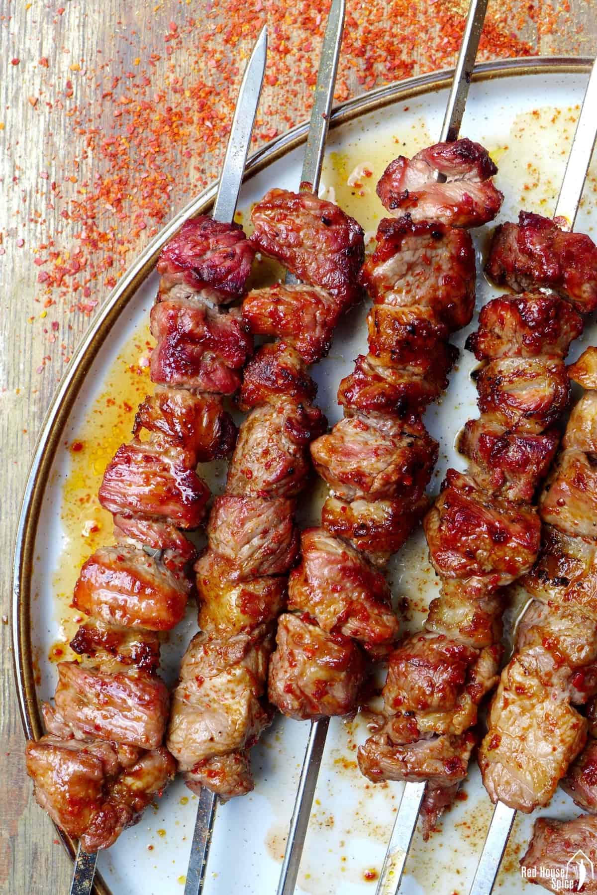 Spicy cumin lamb skewers on a plate