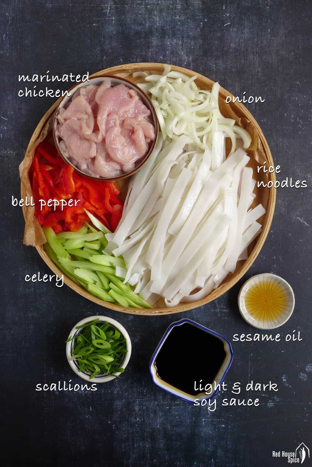 raw ingredients for cooking chicken chow fun