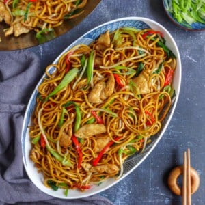 chow mein with chicken, bok choy, bean sprouts and chili pepper.