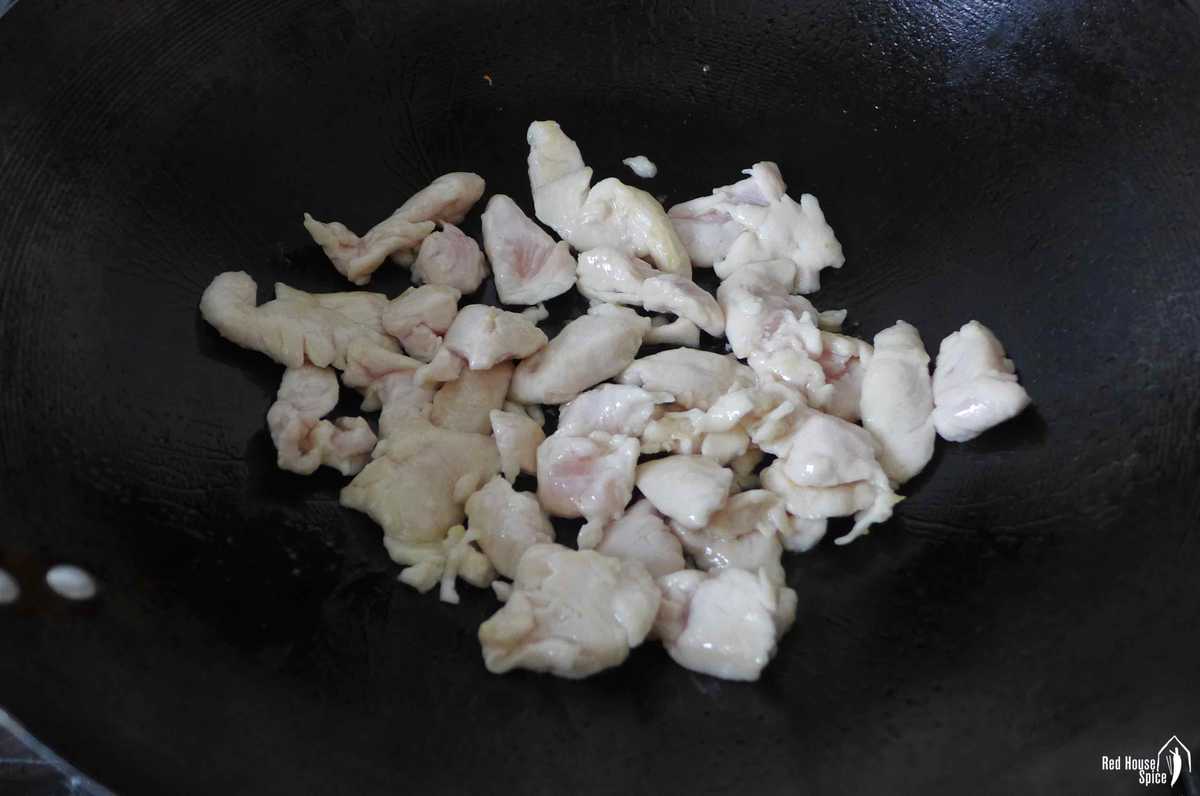 searing chicken pieces.
