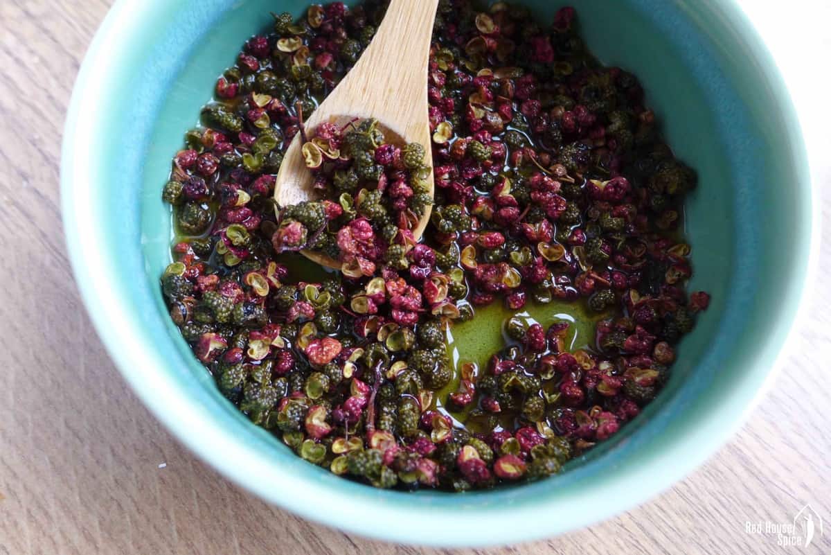 red and green Sichuan pepper soaked in shaoxing rice wine