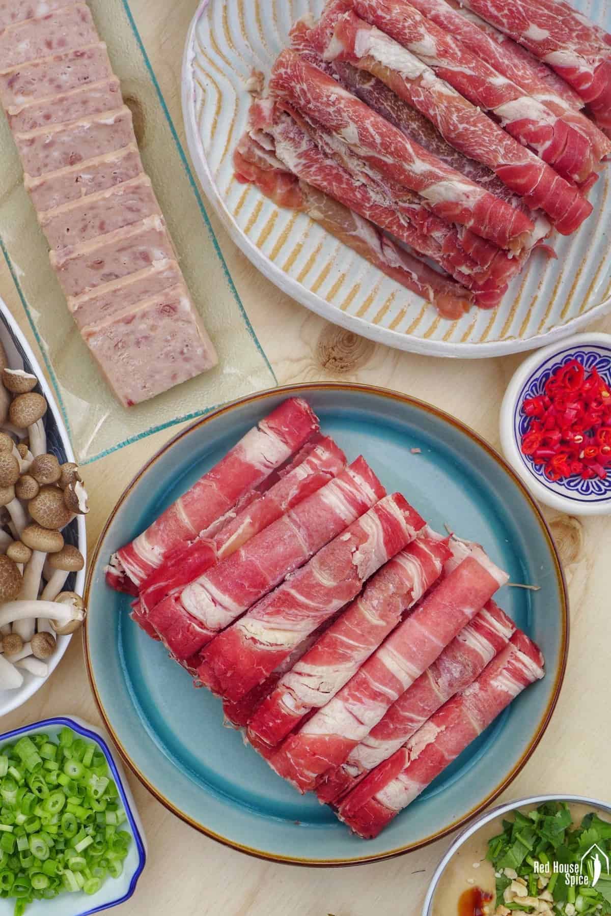 sliced beef rolls with spam
