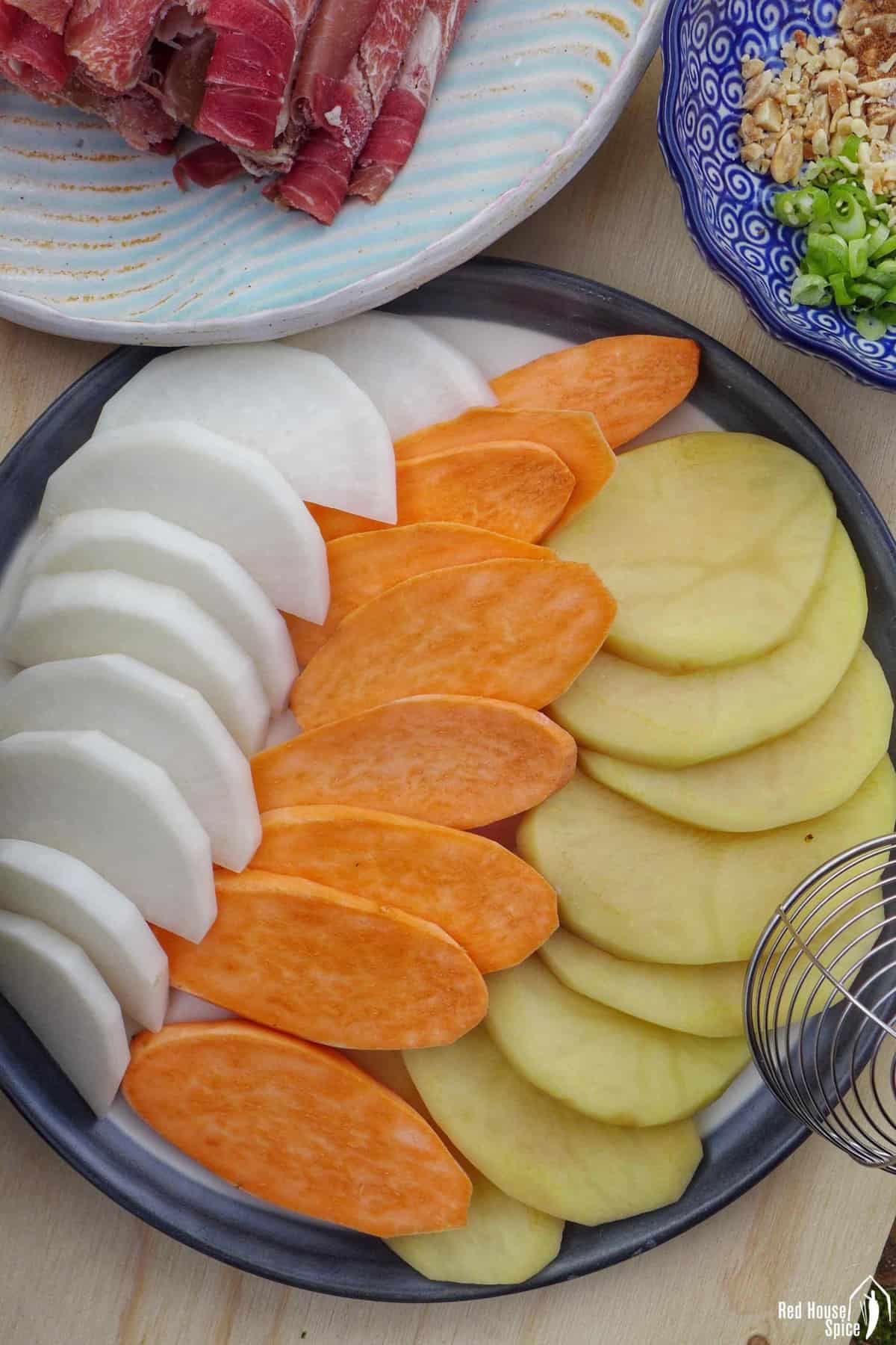 sliced potato, sweet potato and daikon
