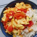 Stir-fried tomato and egg over steamed rice.