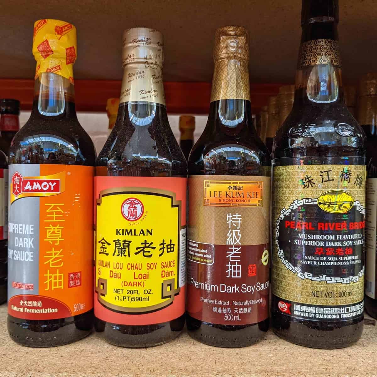Four bottles of dark soy sauce.